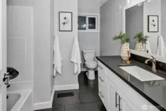 Updated bathrooms throughout.