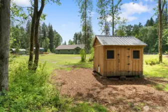 Chicken coop made from wood harvested from the property
