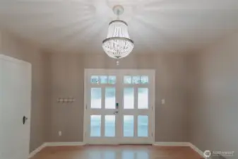 gorgeous french doors with reed glass, crystal chandelier