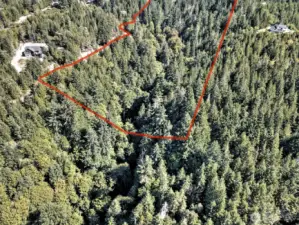 With the terrain issues and the height restrictions of drone flying, the photographer was only able to get pieces of the property at a time...lines are approximate