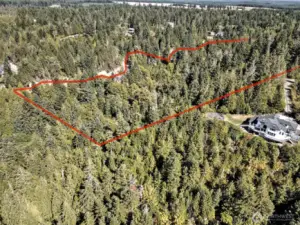 With the terrain issues and the height restrictions of drone flying, the photographer was only able to get pieces of the property at a time...lines are approximate.