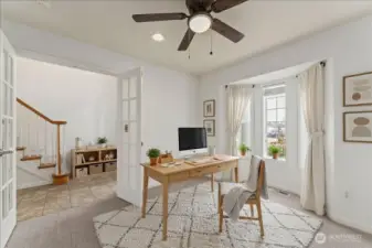 Office on main floor directly off entry way. Virtual staging