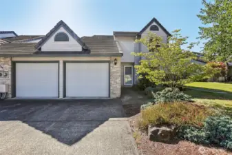 2 parking spaces in front of garage
