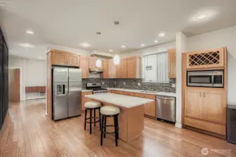 Spacious open concept kitchen w/ island and seating