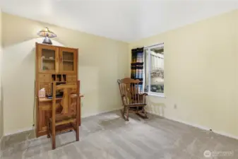 2nd guest bedroom or a super den/office room just off of the entry hall.