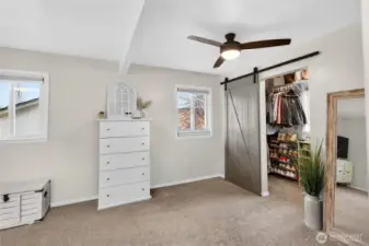 Primary bedroom with walk in closet