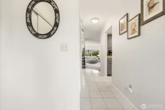 Bright foyer and view of hallway.