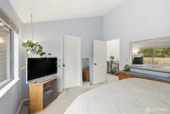 View of bedroom 1 looking into hallway and door to walk in closet.