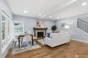 Cozy gas fireplace with bright, inviting living space