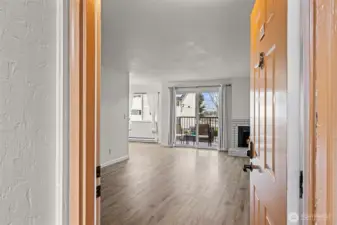 Front entrance welcomes you with beaming lvp flooring throughout the unit.