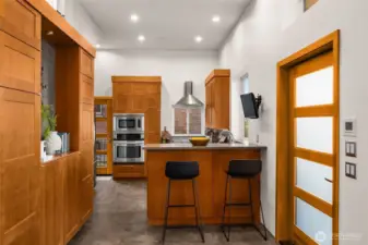 Custom cabinetry with stainless steel apppliances.