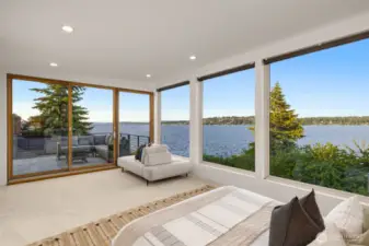 View from the primary bedroom. The primary bedroom features new carpet, an oversized 5-bath suite, french doors, custom walk-in-closet and a slider out to the expansive deck.
