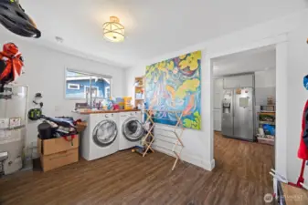 Another view of the laundry room that is just off the kitchen.
