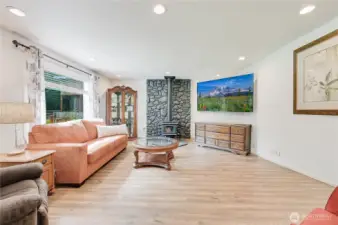 Rec room off the kitchen with woodstove