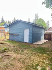 This is a new workshop at the back of the property.  Just under 400sf, it has two entrances, one from the second driveway, one from the backyard.