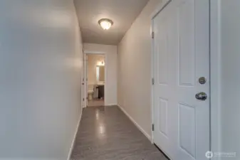 Hallway to Garage and 1/2 Bath
