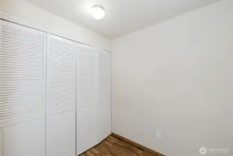 Utility room has plenty of space for overflow storage like Costco purchases or canning supplies.  Furnace and water tank are behind closet doors.
