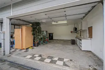 Garage from 2 Door Bay w mounted tv, ac and more cabinets