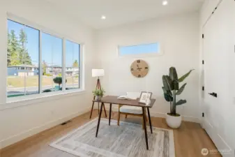 main floor Primary bedroom or use as an office