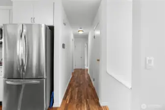 Hallway to bedrooms and 2 bathrooms