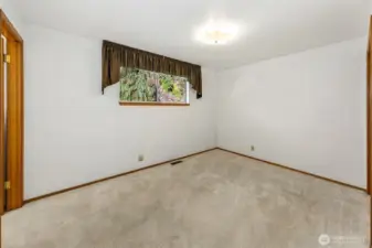 Primary suit off the back of the home has a half bathroom