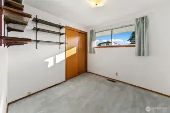 Third bedroom on the main floor/upper level.  Small peek-a-boo views