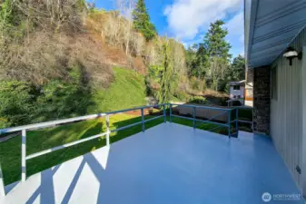 Large entertaining deck, with access to lower yard
