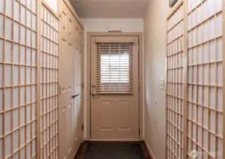 You are welcomed into the home through the artfully decorated entry hall.