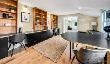 The upper-level includes an open office space with built-ins - perfect for working from home or kid's study space.