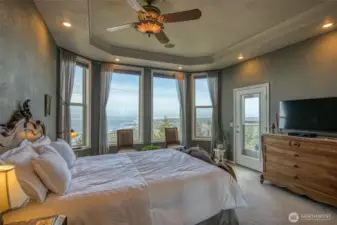 Primary bedroom with ocean views when you wake up every morning. A door leads out to the main sundeck. The bathroom features an amazing jetted tub with ocean views while you soak. Oh my!