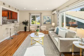 Beautiful hardwood floors and natural light enhance everyday living.