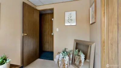 There is a large closet in the hallway. So much storage space in this home!