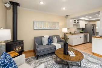 Open to the kitchen, the family room features a newer gas stove for cozy winter nights—along with central AC for year-round comfort.