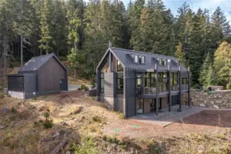 Aerial view of home and garage