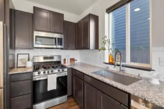 Kitchen with granite counter