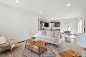 Open concept living, kitchen, dining.