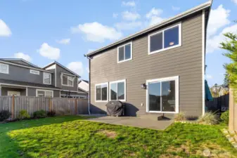 Fully fenced back yard and patio