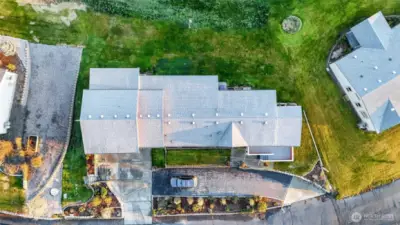 Expansive lawn and easy-care landscaping