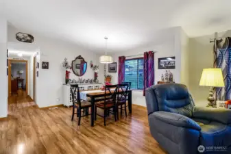 Seamless flow between living, dining, and kitchen areas