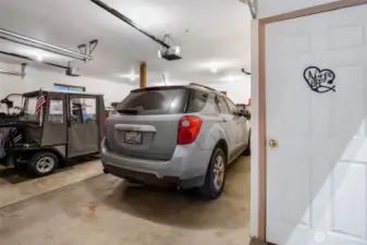 Attached garage offering secure parking and additional storage space