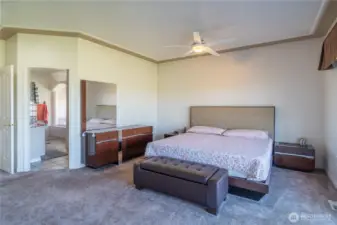 primary bedroom looking at primary bath entry