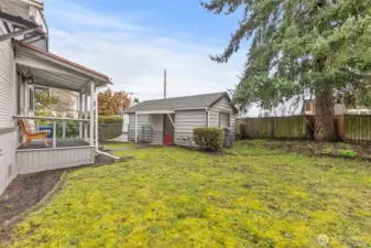 Home, yard and detached garage.