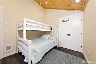 Main level bedroom and closet.