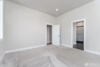 Primary bedroom looking towards primary bathroom.