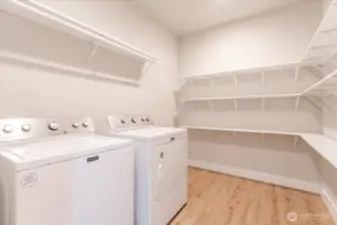 Laundry room with lots of storage.
