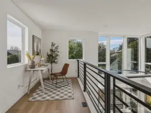 Lofted area perfect for an office or dining space!