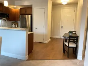 Easy-care hardwood floors in the entry and kitchen. There's even room for a table and chairs.