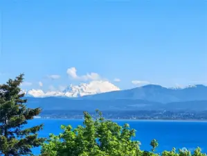 Mount Baker is a site from every room of this view home located in the Country Club.