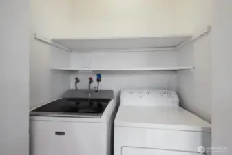 Full size laundry, located off of the kitchen.
