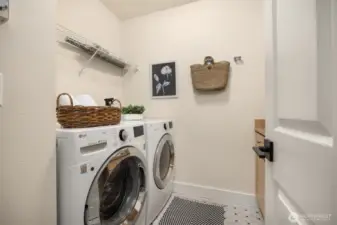 Large laundry room with great storage.